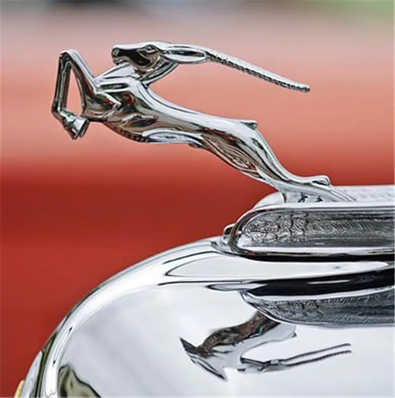 A dynamic leaping jaguar hood ornament
