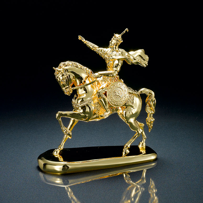 An intricate custom trophy by Jin Jumbo featuring a warrior on horseback.