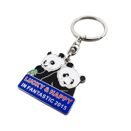 A commemorative keychain from 2015 featuring two panda bears.