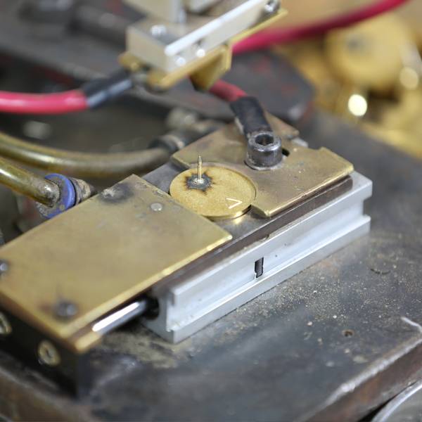 Attachment fusion process using a precision mechanical device.