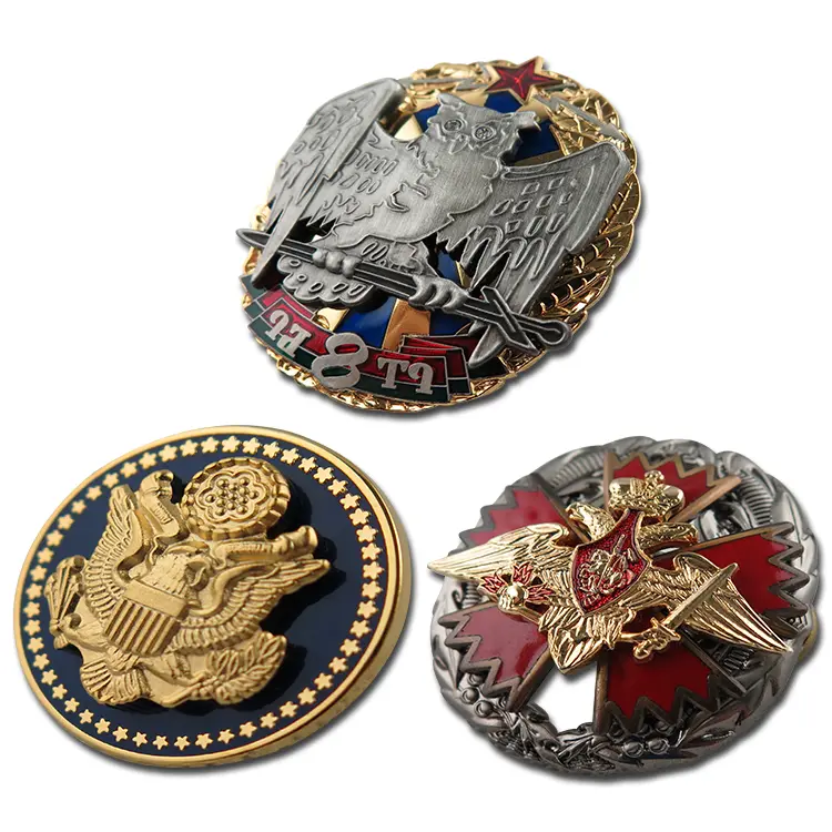A collection of custom military pins and badges with eagle designs.