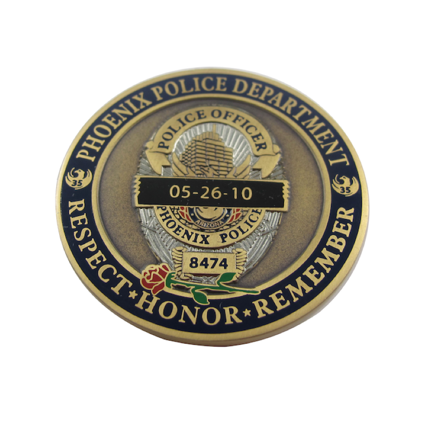 A custom challenge coin by Jin Jumbo made to honor the Phoenix Police Department.