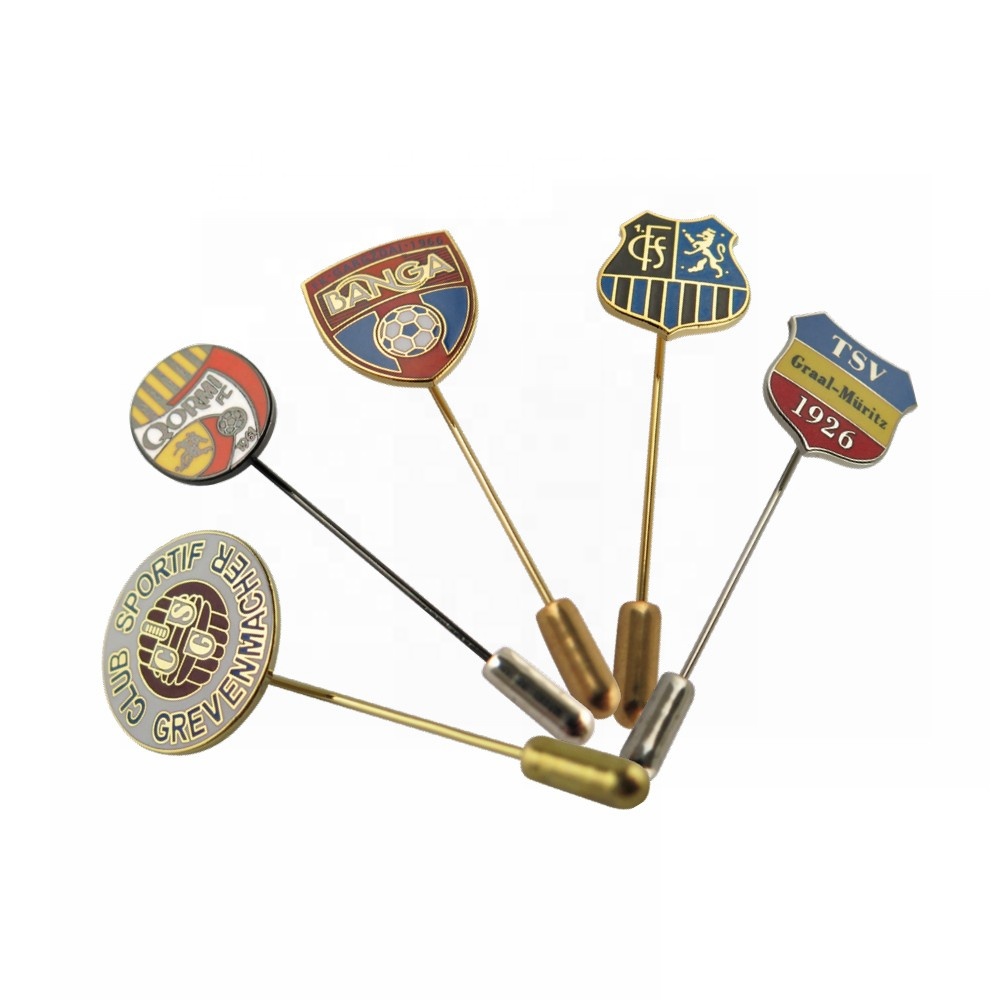A variety of custom-made lapel pins for different organizations and sports teams.