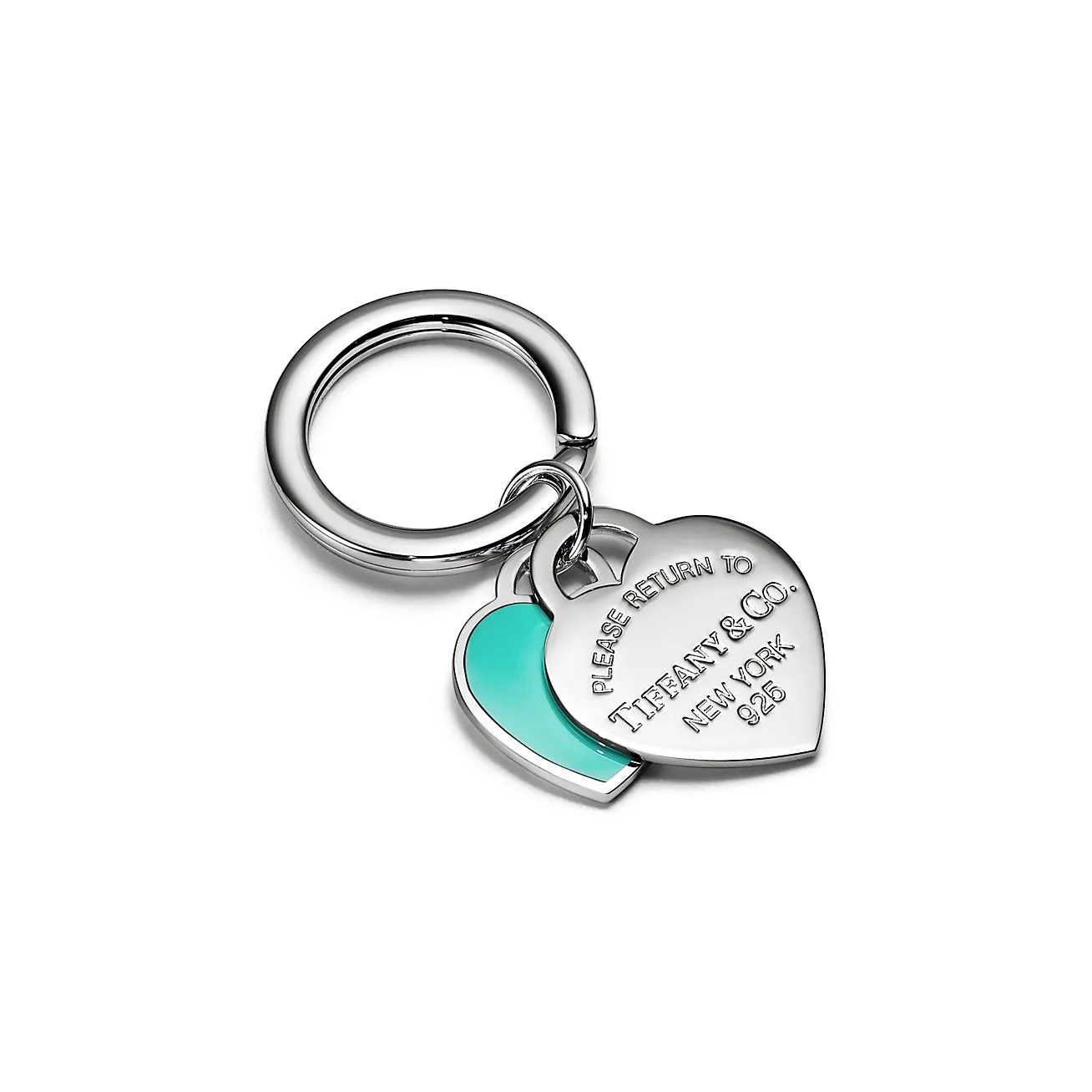 A Tiffany & Co. silver heart keychain, a prime example of brand artistry.